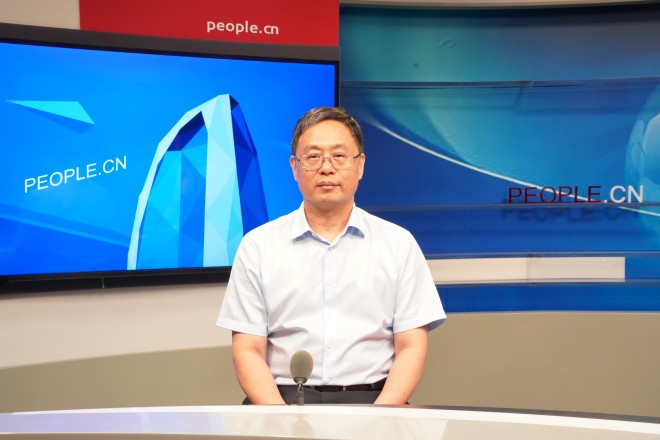 中國藝術研究院院長、黨委副書記周慶富做客人民網。張力洋攝